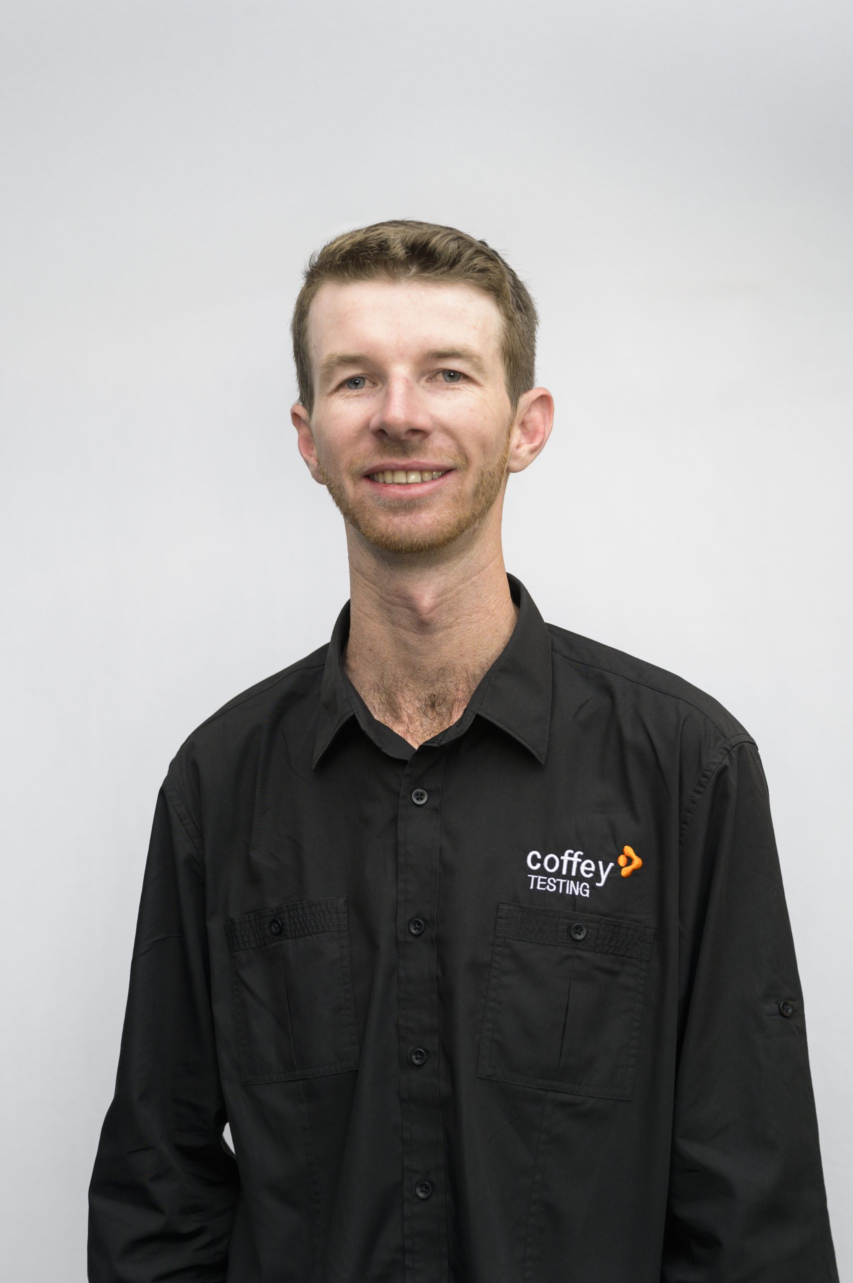 Thomas Robey, Laboratory Manager at Coffey Testing, overseeing soil, concrete, and aggregate testing in the Central Coast region.